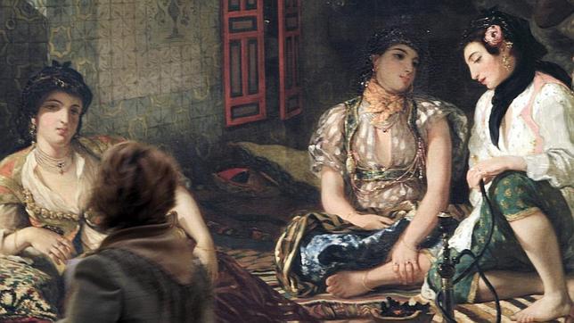 Una joven admira «Las mujeres de Argel en su aposento», de Delacroix. EFE