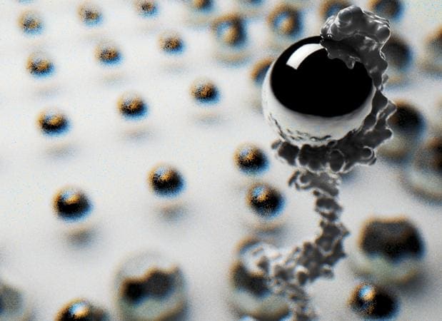 Representación de un robot de ADN ensamblado a una molécula