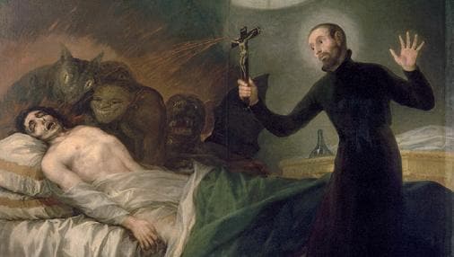 San Francisco de Borja realizando un exorcismo con un crucifijo.