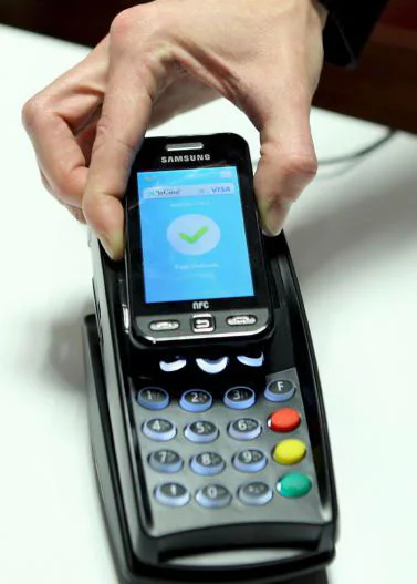 Telefónica, Visa y La Caixa prueban el pago con móvil
