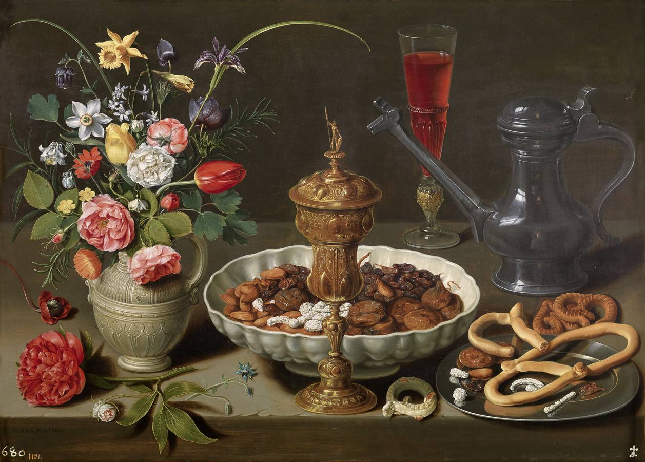 «Bodegón con flores, copa de plata dorada, almendras, frutos secos, dulces, panecillos, vino y jarra de peltre» (1611), de Clara Peeters