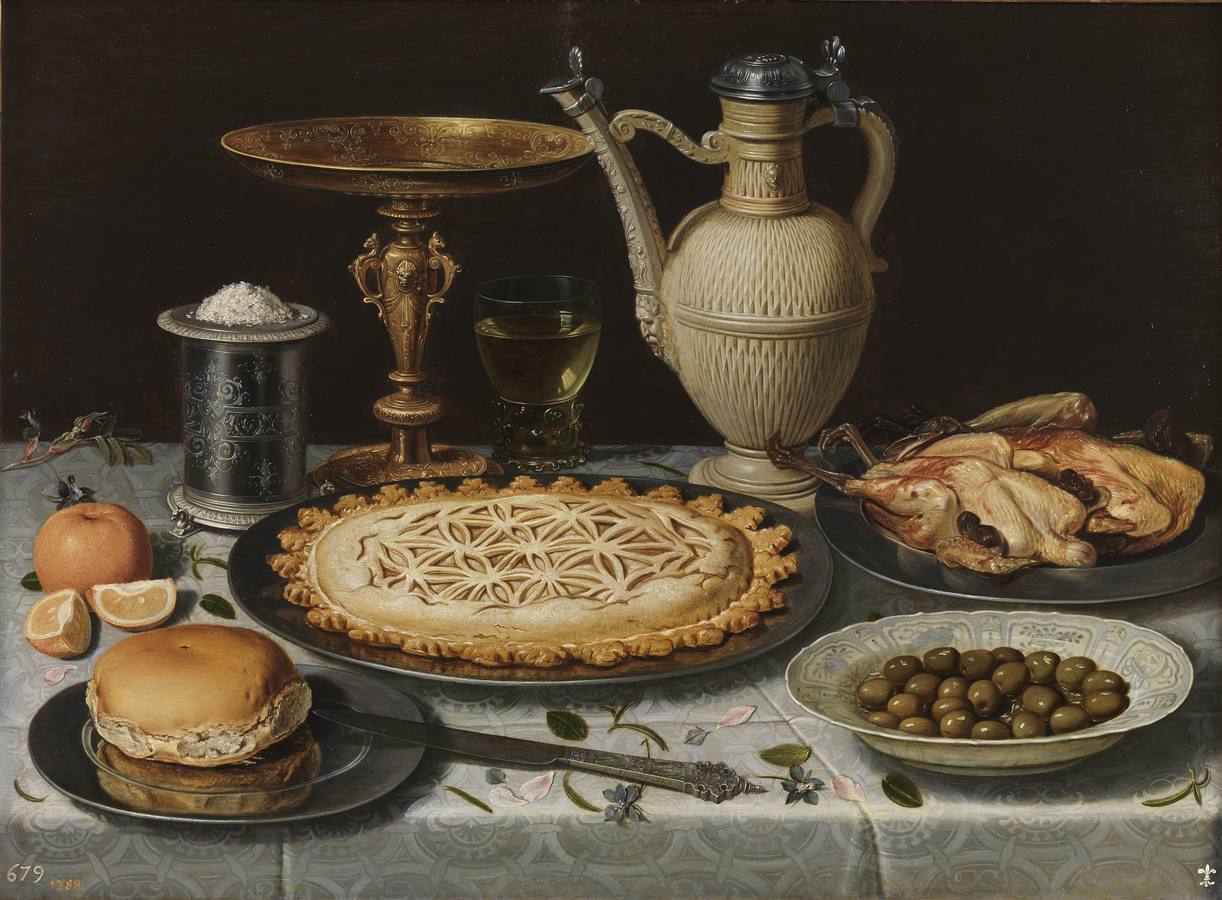 «Mesa con mantel, salero, taza dorada, pastel, jarra, plato de porcelana con aceitunas y aves asadas» (c. 1611), de Clara Peeters