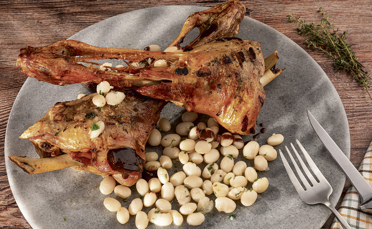 Pierna de cordero con pochas